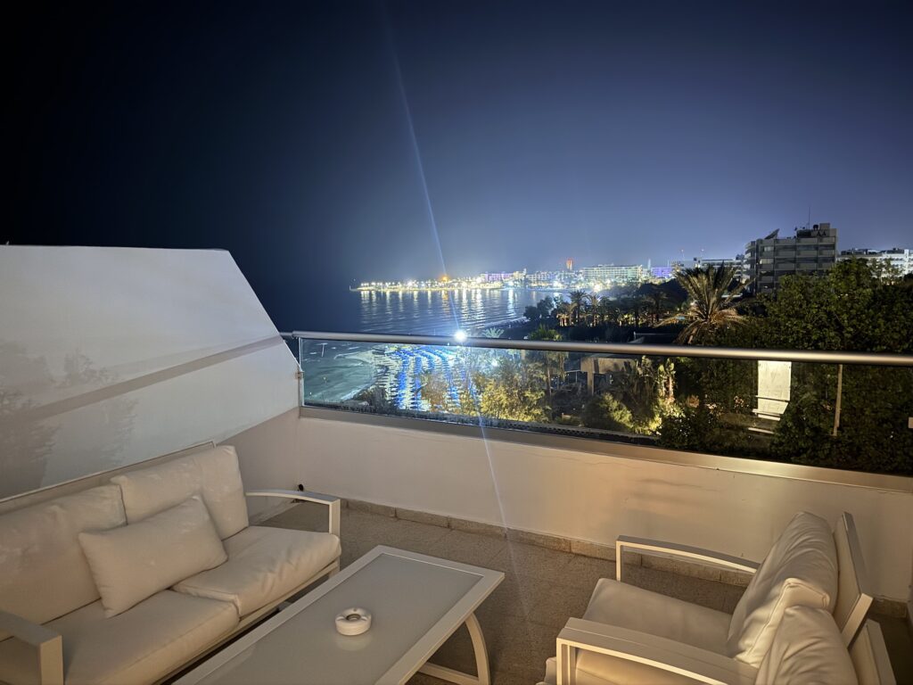 The balcony at Grecians Sands hotel by Metiya
