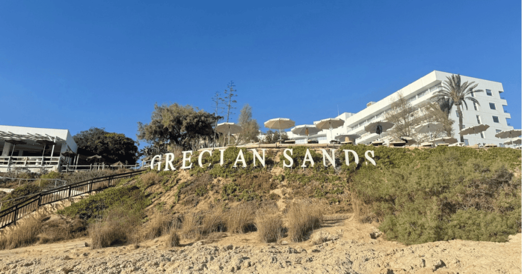 Grecian Sands Hotel review beach shot by Metiya